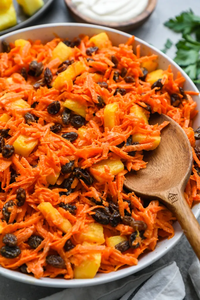 Grated carrot with pineapple cubes